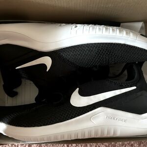 Brand NEW size 6 Nike Free Trainers. Never worn.